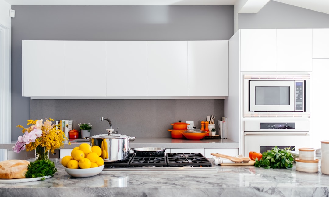A well-organized kitchen with essential cooking tools and storage solutions, showcasing a clean and efficient cooking space.