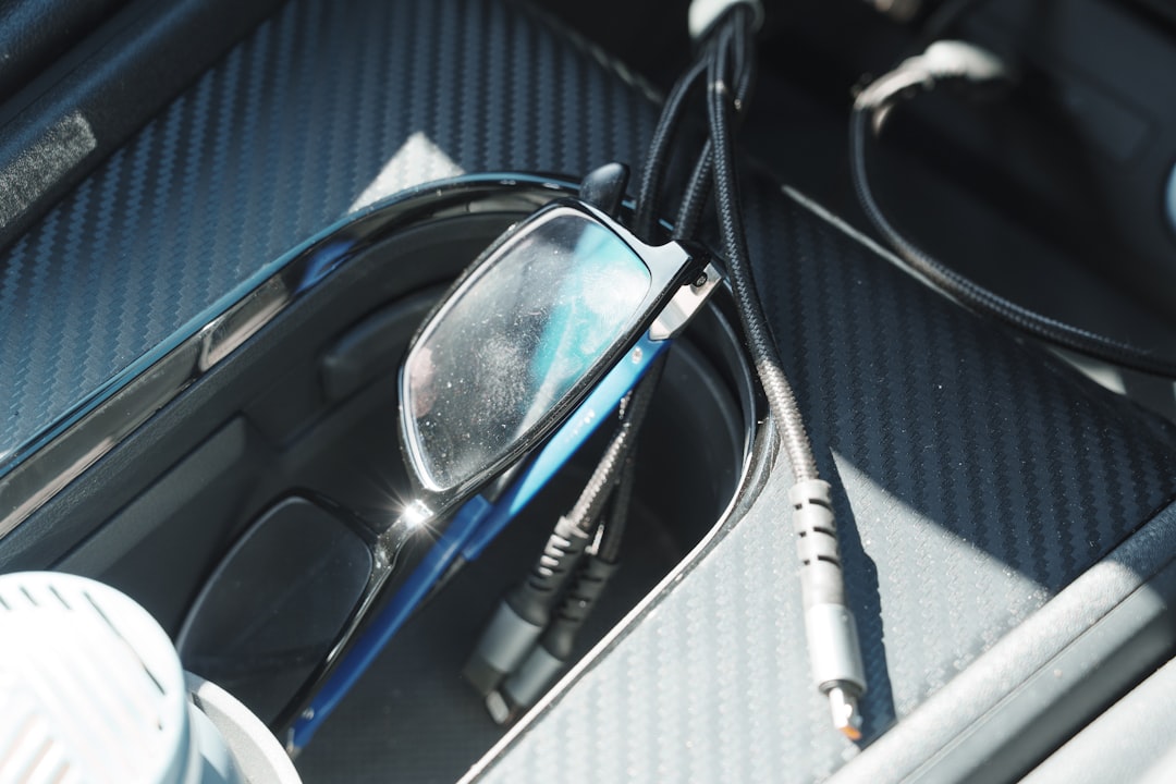 A neatly organized car interior with comfortable seating and well-arranged items for a long journey.